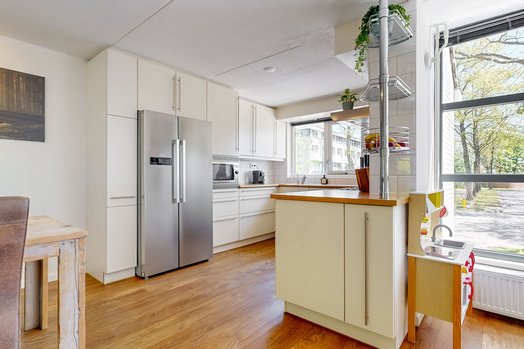 Spacious drive-in home with split-level layout and rooftop terrace in Houten — 12