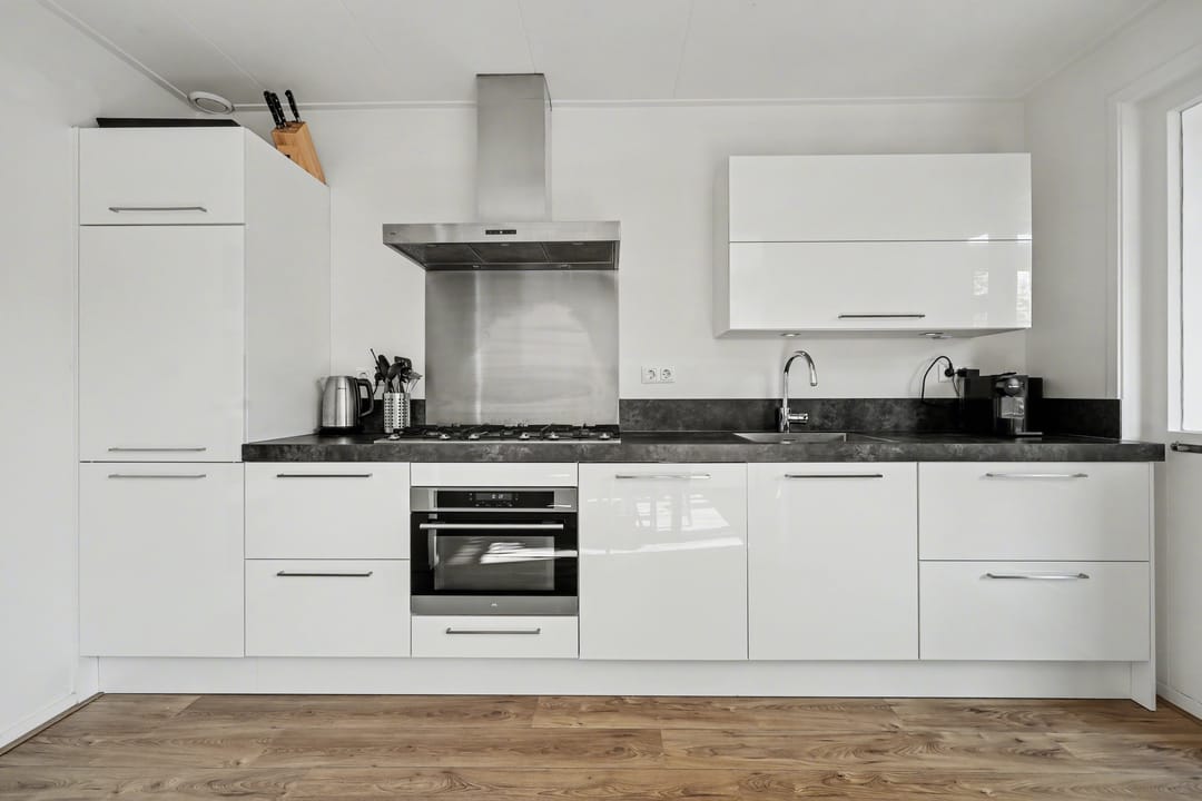 Spacious corner home with three bedrooms and deep backyard — 16