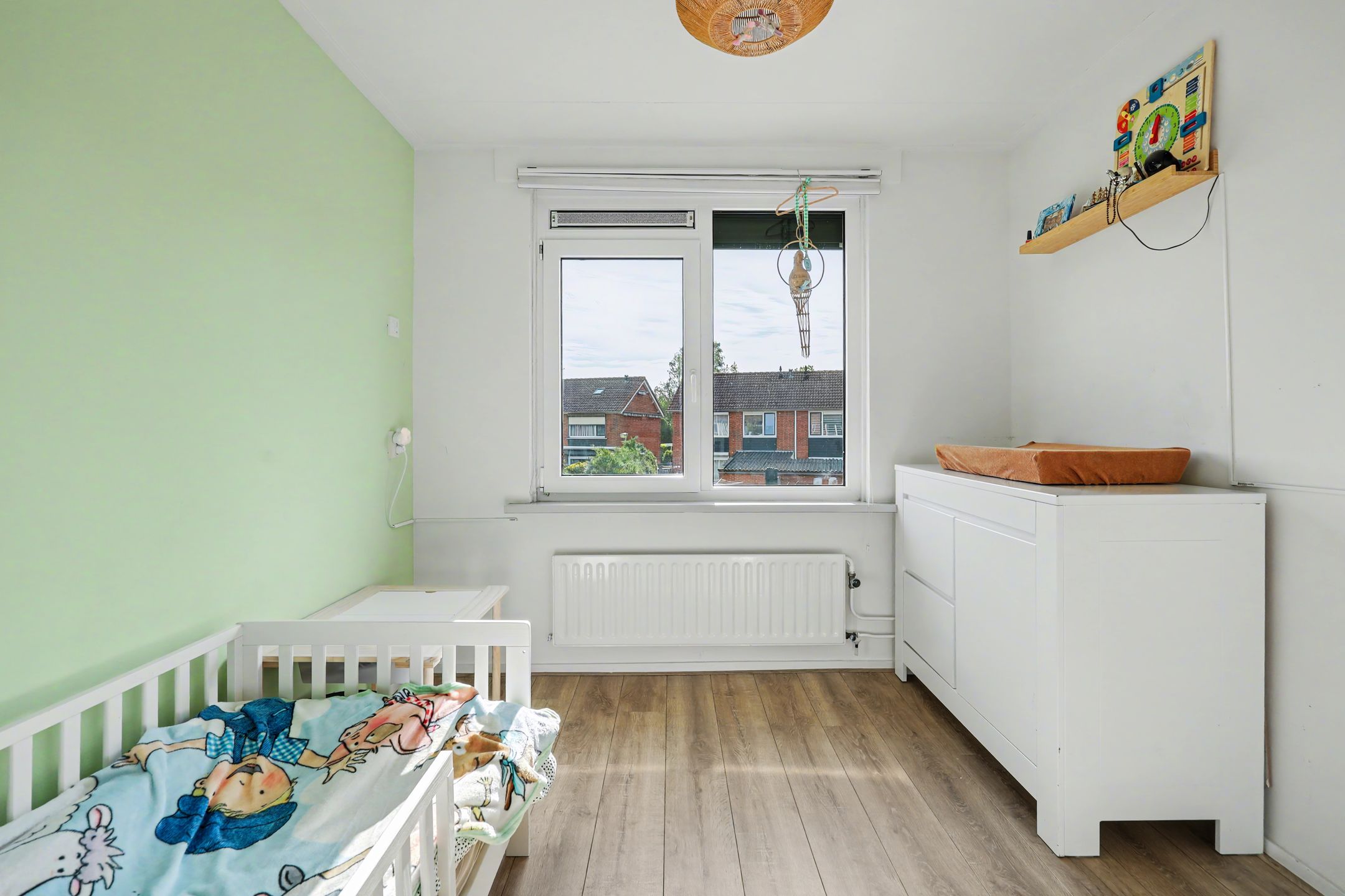 Spacious corner home with three bedrooms and deep backyard — 24