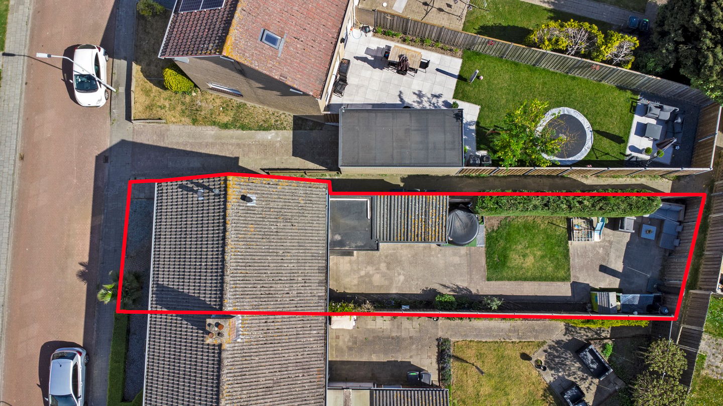 Spacious corner home with three bedrooms and deep backyard — 40