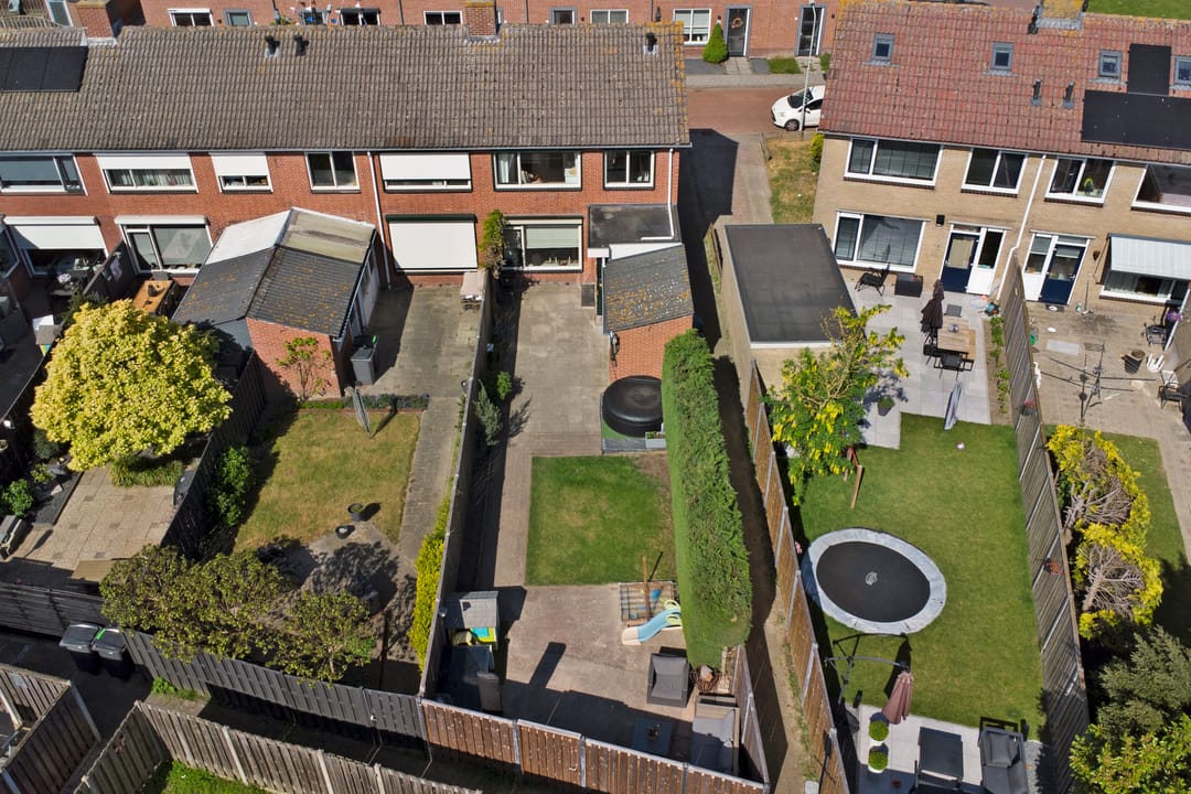 Spacious corner home with three bedrooms and deep backyard — 38