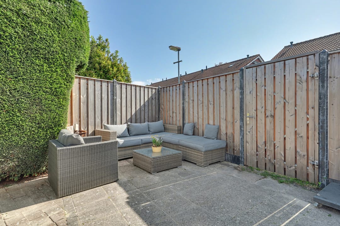 Spacious corner home with three bedrooms and deep backyard — 32