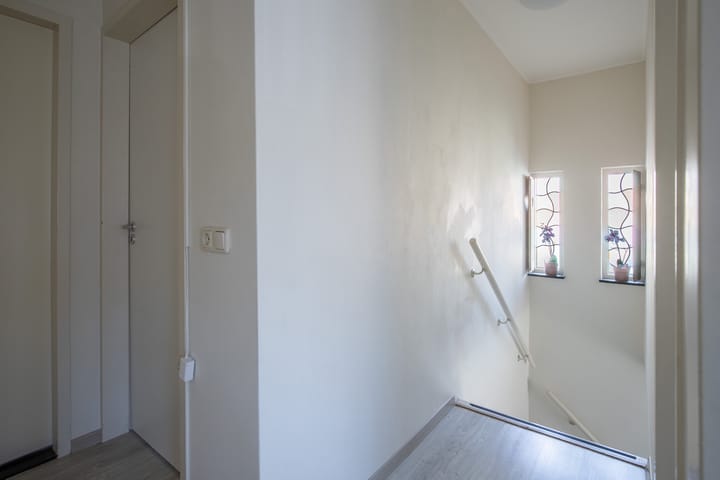 Tussenwoning te koop: Schout Boutenstraat 22, Buchten