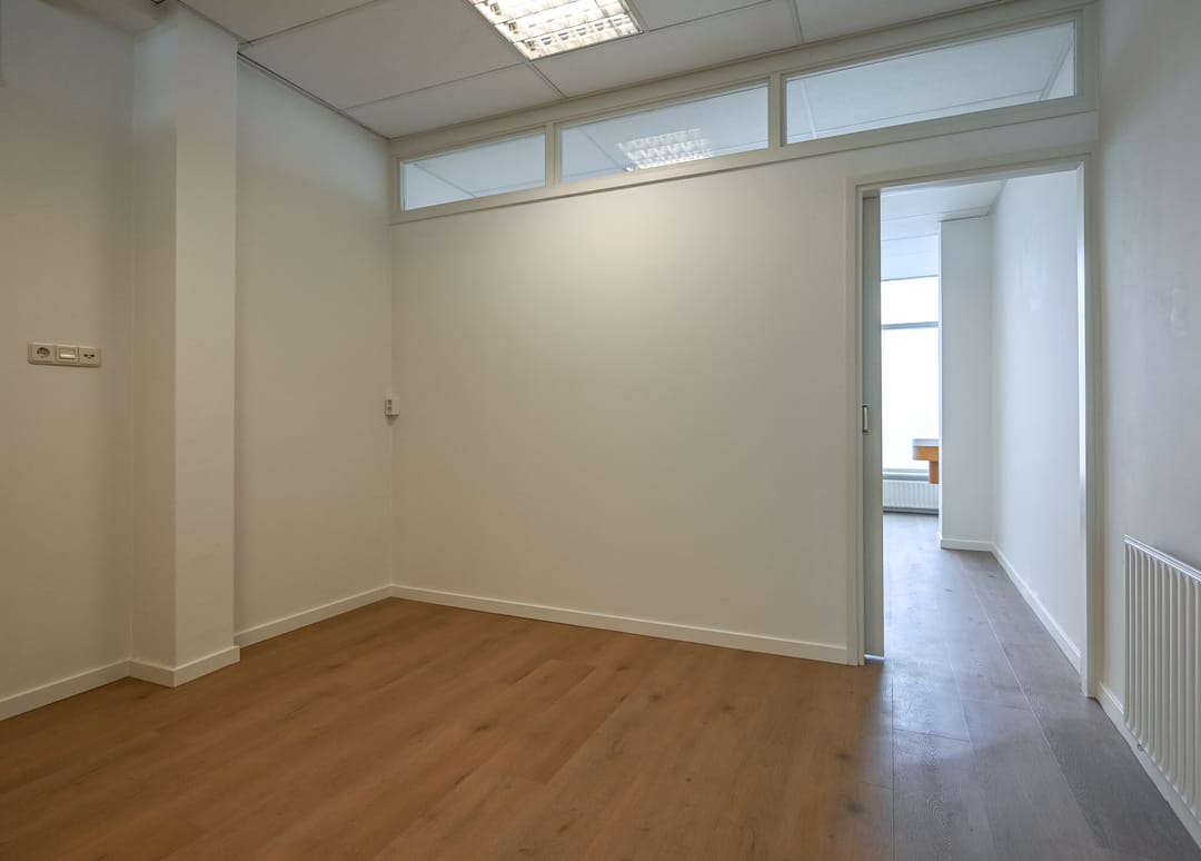Versatile Mixed-Use Property with Commercial Space and Upper Apartment on Lively Kennemerlaan — 28