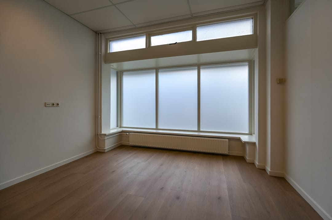 Versatile Mixed-Use Property with Commercial Space and Upper Apartment on Lively Kennemerlaan — 23