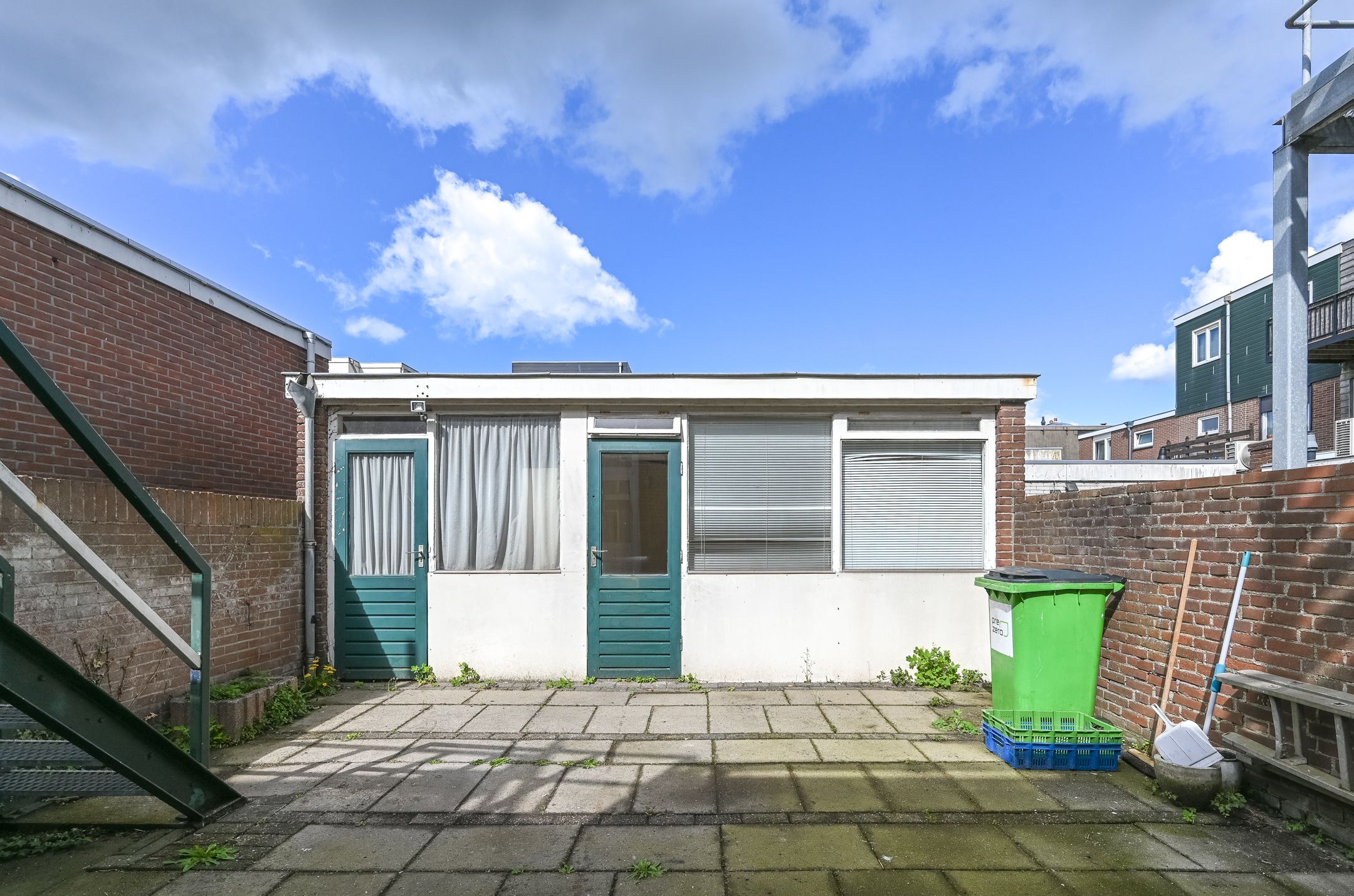 Versatile Mixed-Use Property with Commercial Space and Upper Apartment on Lively Kennemerlaan — 36
