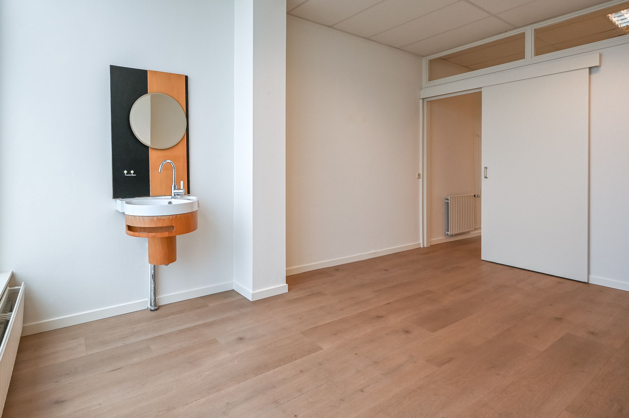 Versatile Mixed-Use Property with Commercial Space and Upper Apartment on Lively Kennemerlaan — 30