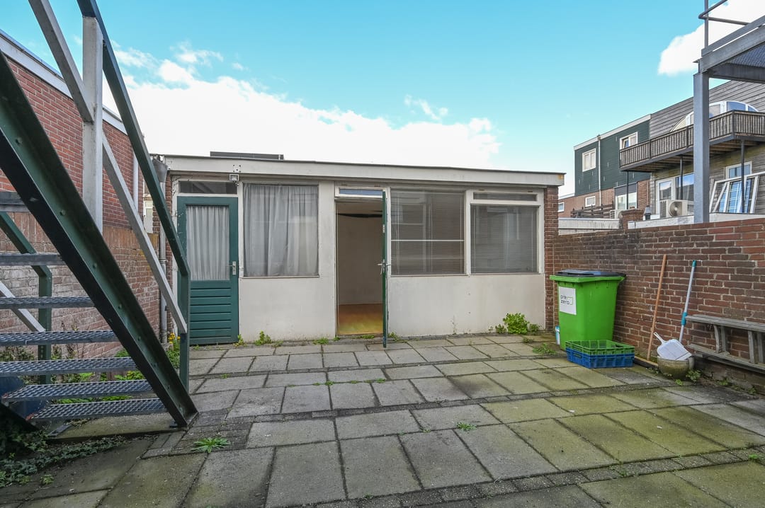 Versatile Mixed-Use Property with Commercial Space and Upper Apartment on Lively Kennemerlaan — 37