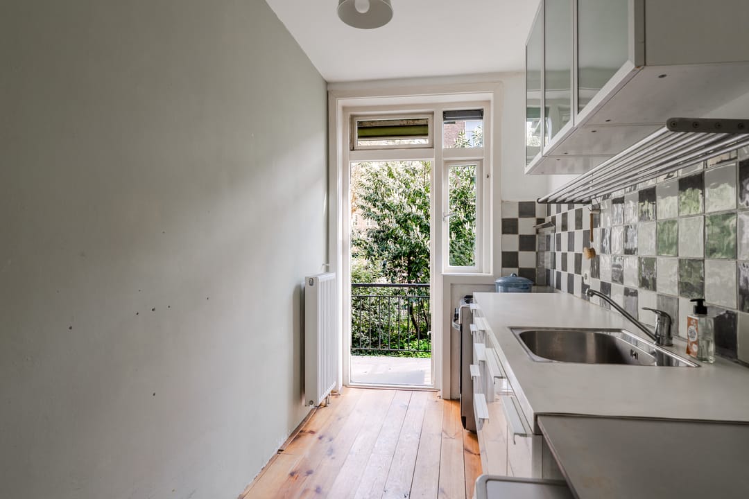 Bright 3-Bedroom Apartment in Amsterdam's Sought-After Bos en Lommer with Dual Balconies — 17