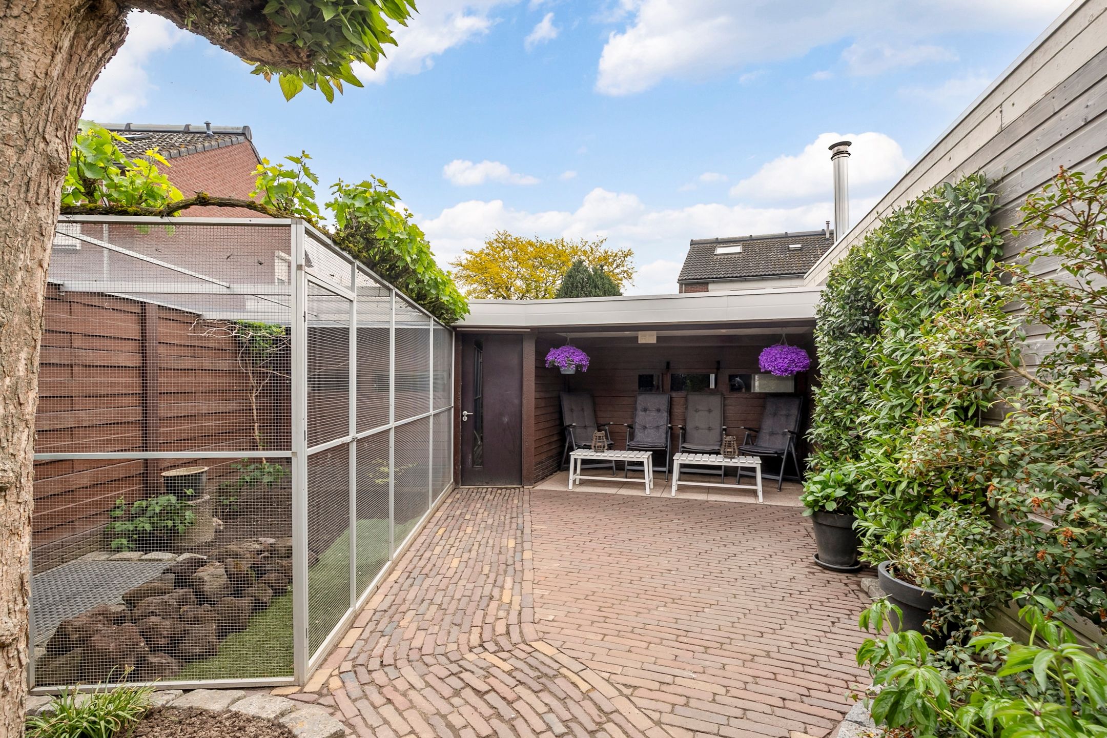 Spacious extended semi-detached family home with garage and deep garden in Lobith — 21