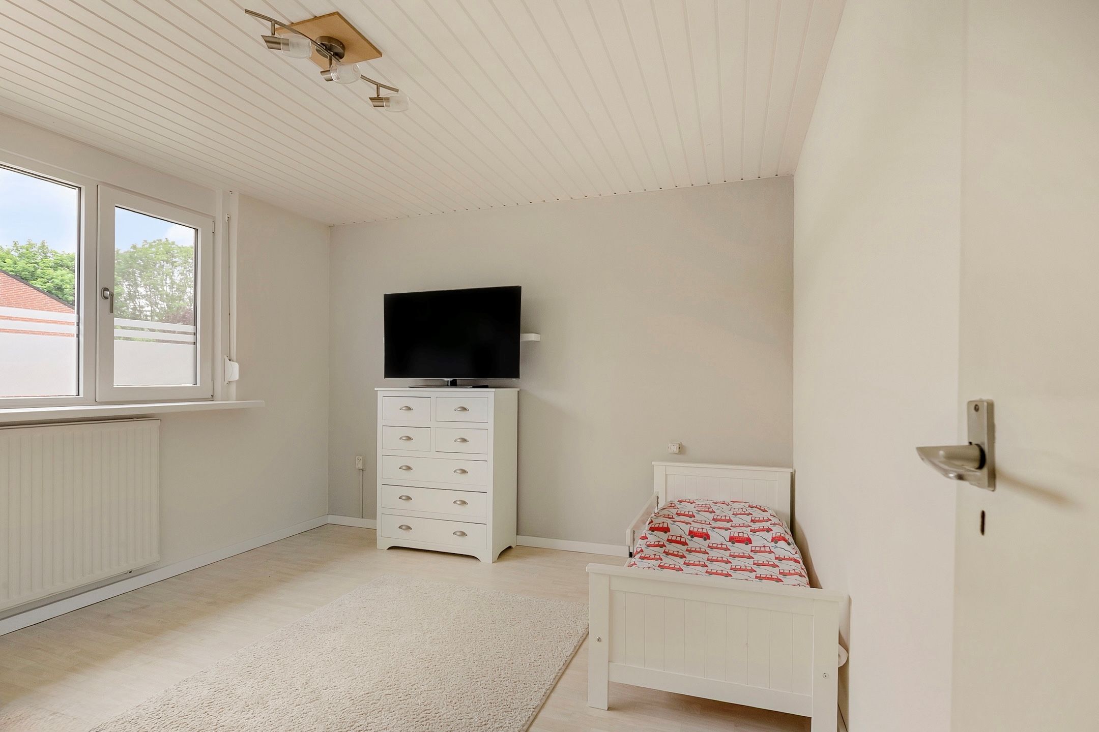 Spacious extended semi-detached family home with garage and deep garden in Lobith — 27