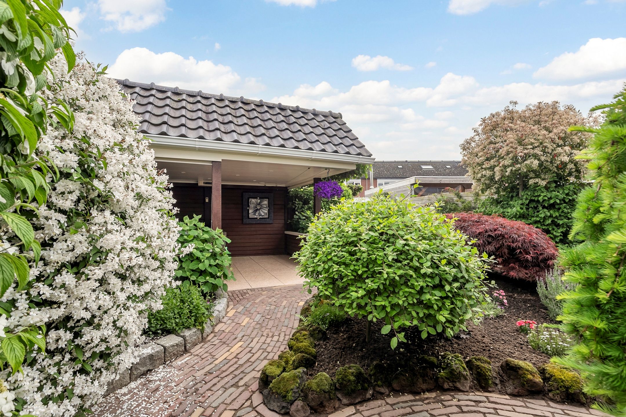 Spacious extended semi-detached family home with garage and deep garden in Lobith — 24
