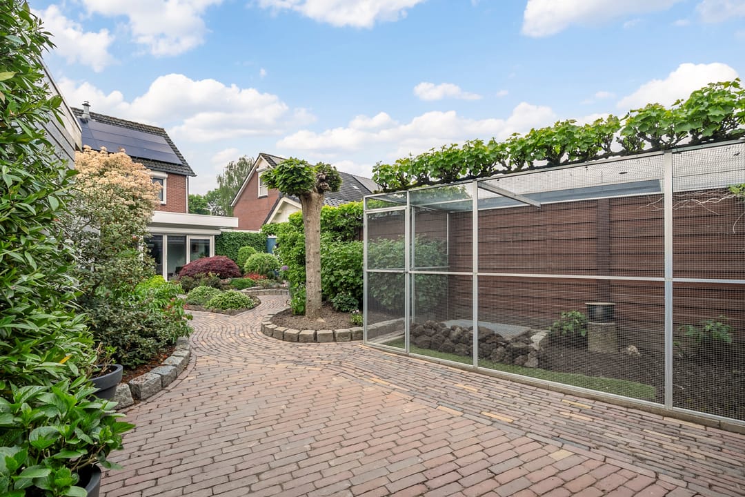 Spacious extended semi-detached family home with garage and deep garden in Lobith — 22