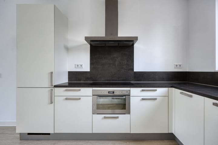 Tussenwoning te koop: Suikerdoossingel 21, Maasbracht