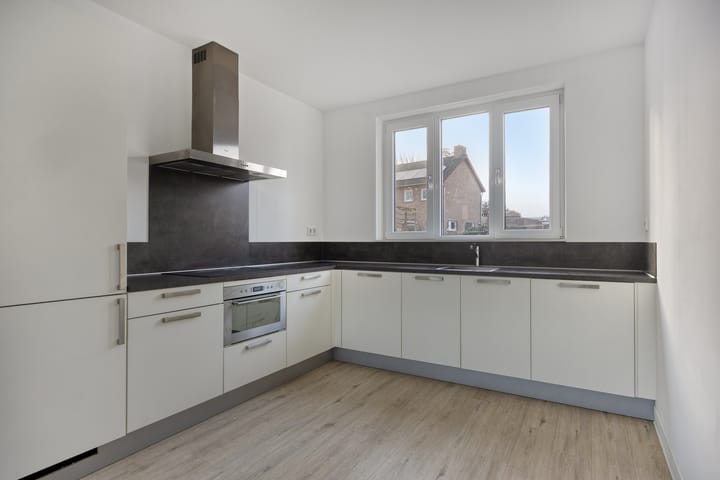 Tussenwoning te koop: Suikerdoossingel 21, Maasbracht