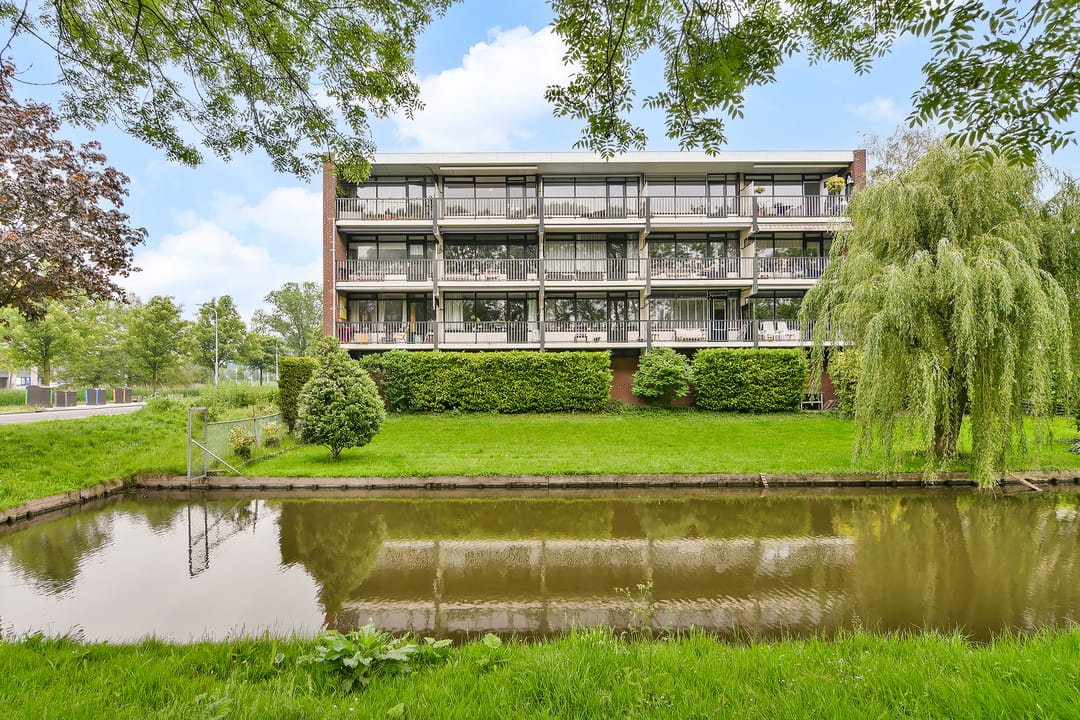 Fully Renovated Top Floor Apartment with Sunny Balcony and Water Views — 28