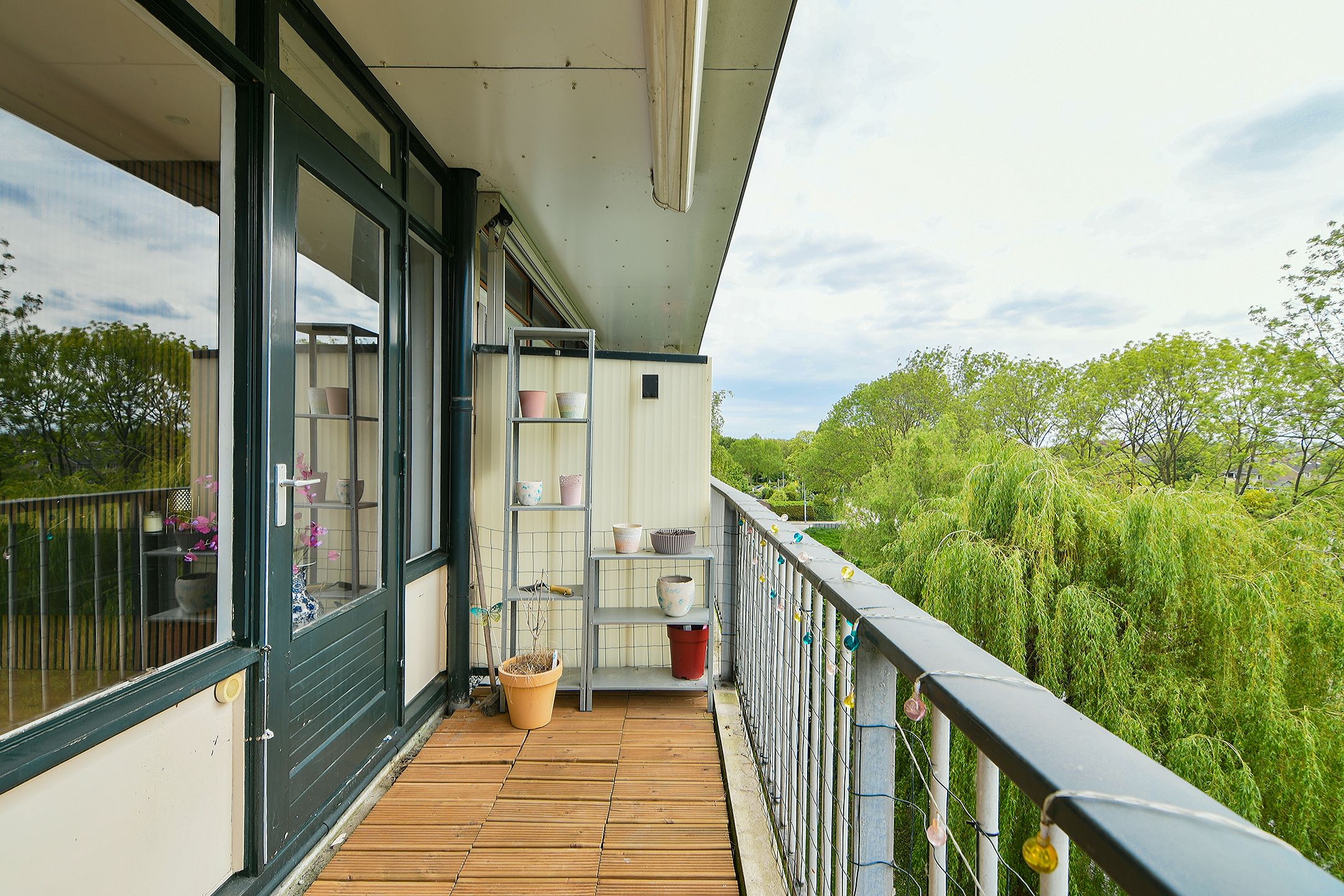 Fully Renovated Top Floor Apartment with Sunny Balcony and Water Views — 27