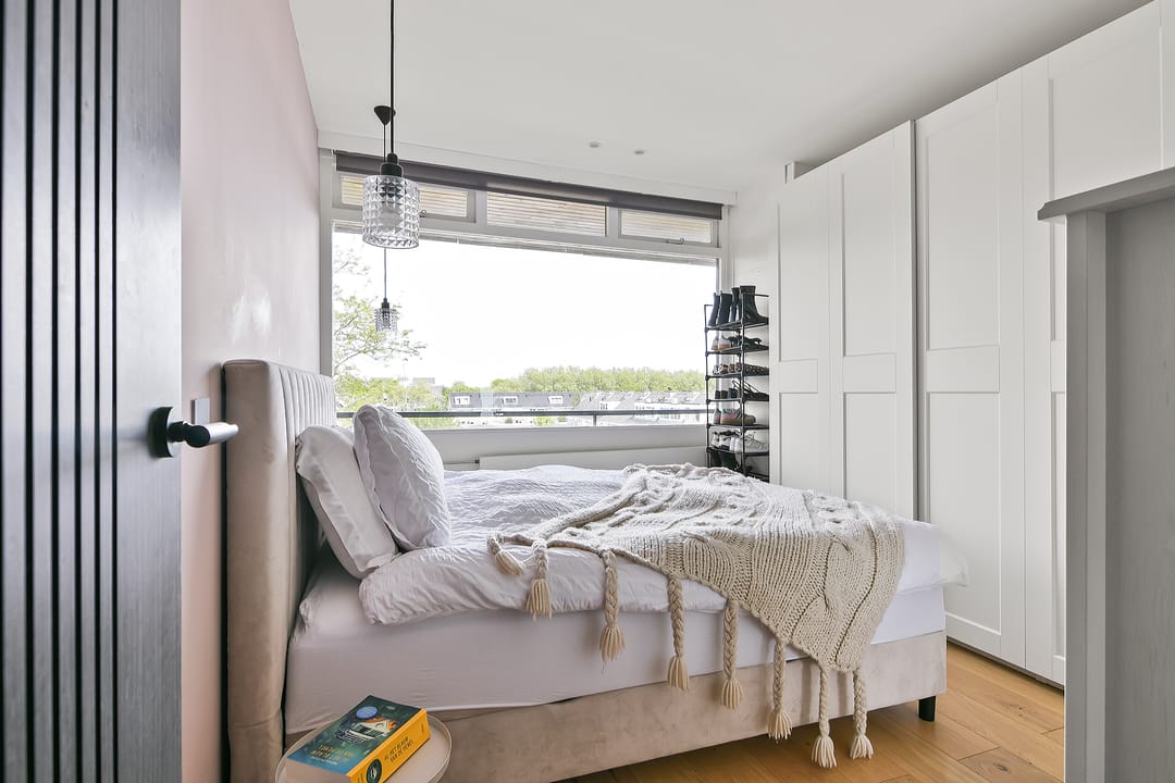 Fully Renovated Top Floor Apartment with Sunny Balcony and Water Views — 13