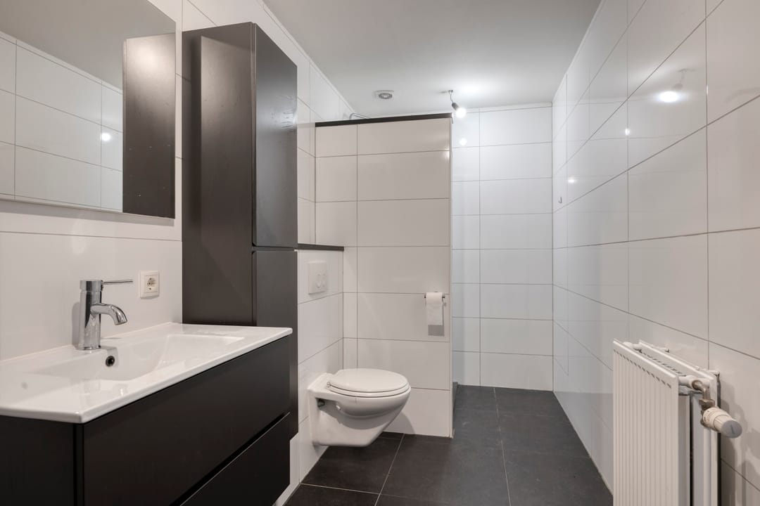 Modern Ground Floor Apartment with Private Parking in Oss City Center — 17