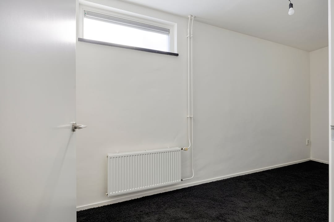 Modern Ground Floor Apartment with Private Parking in Oss City Center — 11