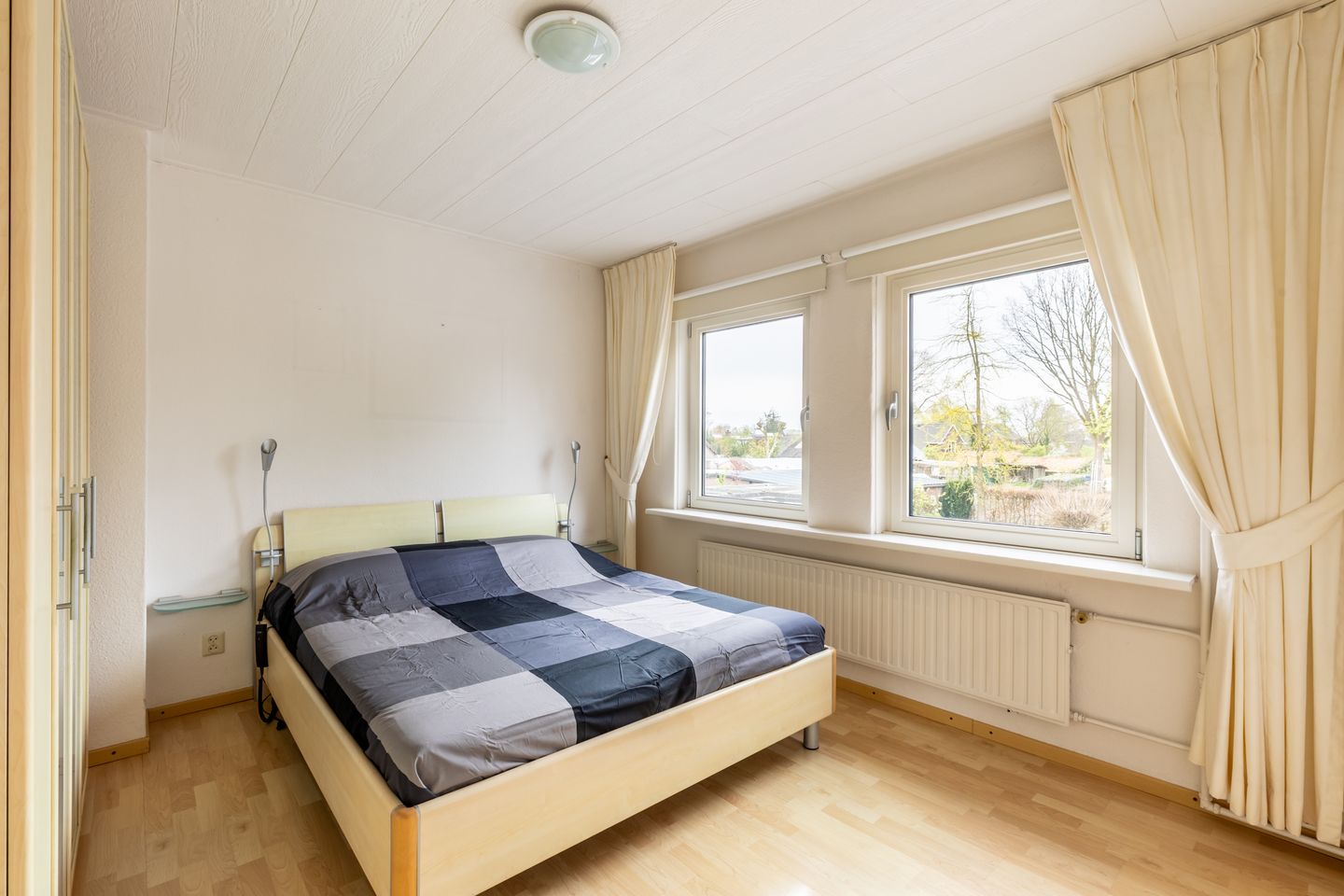 Extended semi-detached house with deep southeast-facing backyard — 19