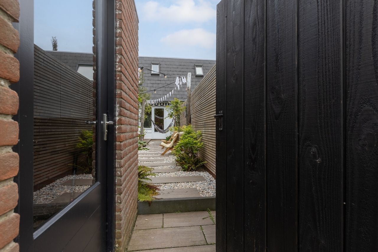 Move-in ready terraced house with modern kitchen and south-facing garden in Meilust-Noord — 36