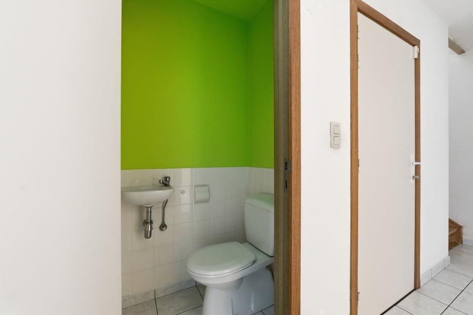 Well-maintained terraced home with 3 bedrooms, garage and garden in Riemst — 18