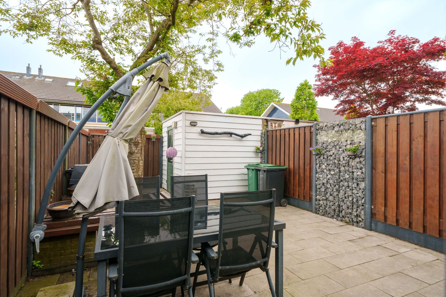 Well-maintained terraced home with sunny southwest garden and modern kitchen in family-friendly Almere neighborhood — 25