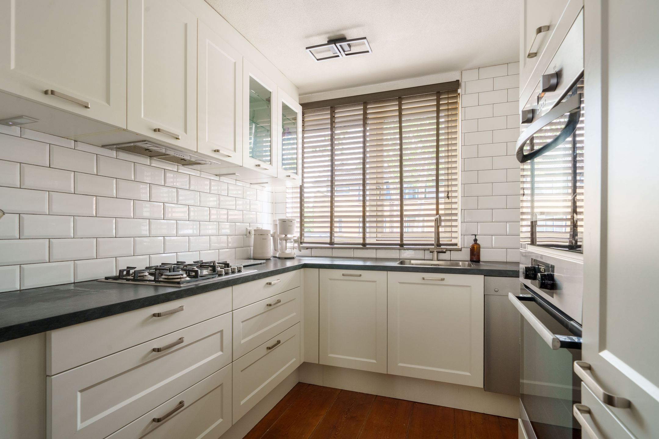 Well-maintained terraced home with sunny southwest garden and modern kitchen in family-friendly Almere neighborhood — 9