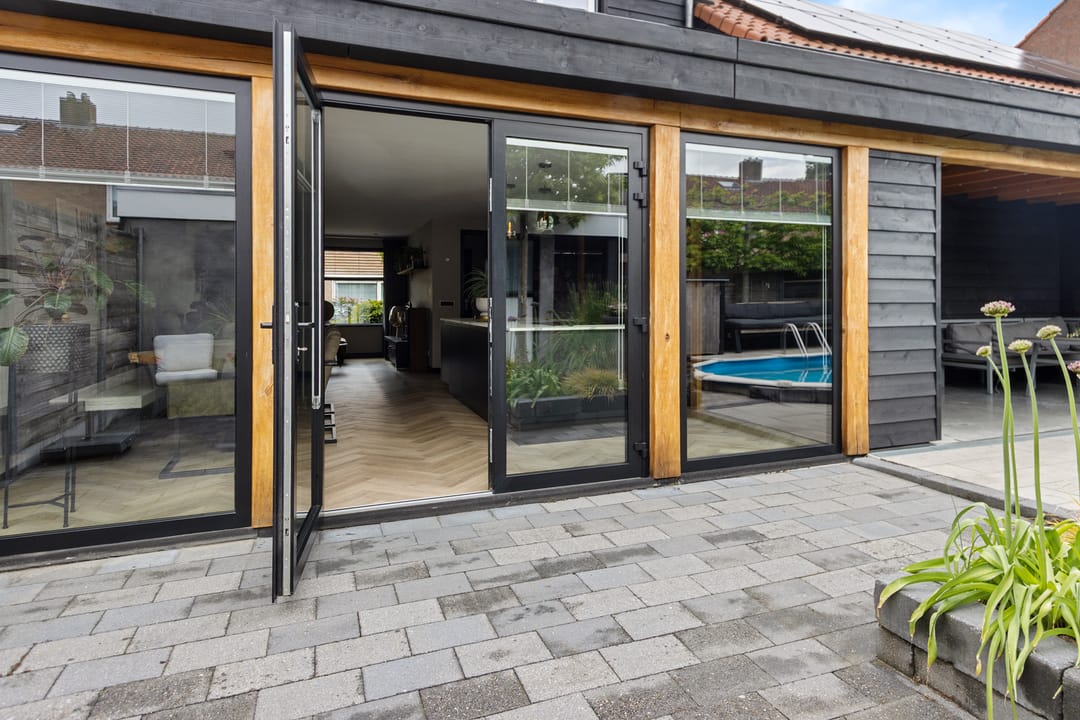 Completely Renovated Corner Home with Heated Pool and Garage in Central Emmeloord — 46