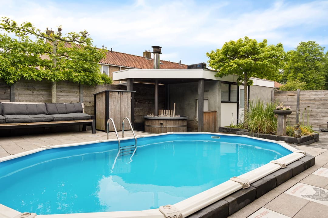 Completely Renovated Corner Home with Heated Pool and Garage in Central Emmeloord — 43