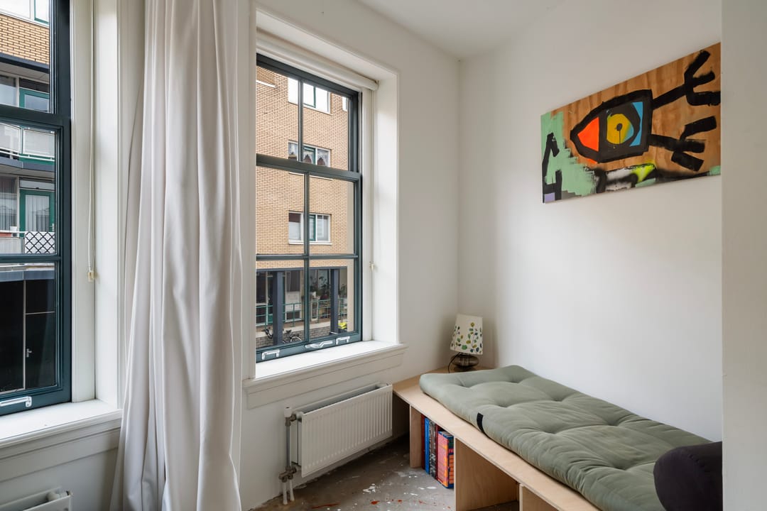 Renovated terraced house with west-facing terrace and private parking in historic Delfshaven — 37
