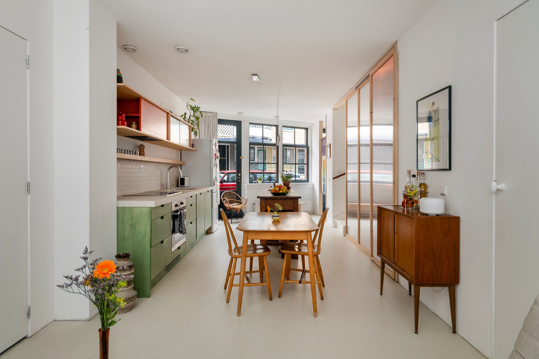 Renovated terraced house with west-facing terrace and private parking in historic Delfshaven — 18