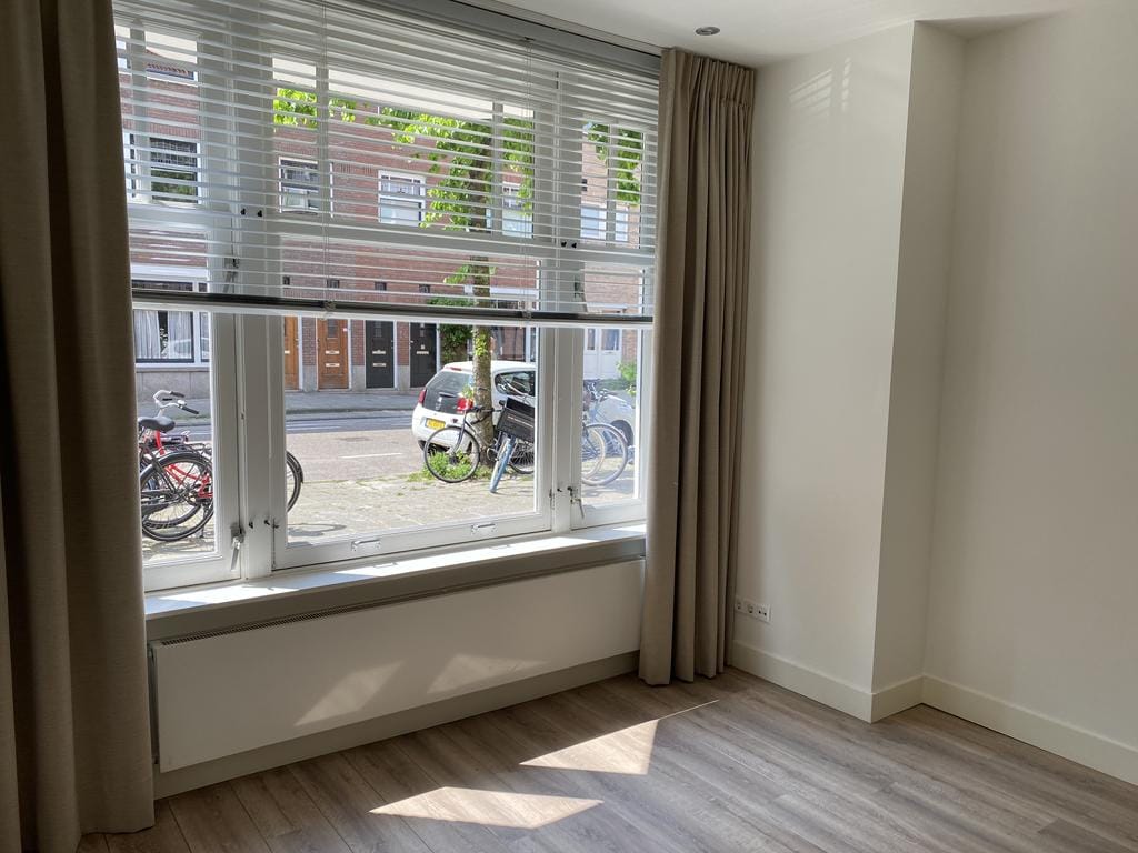 Photo 10 of Woestduinstraat 33-H
