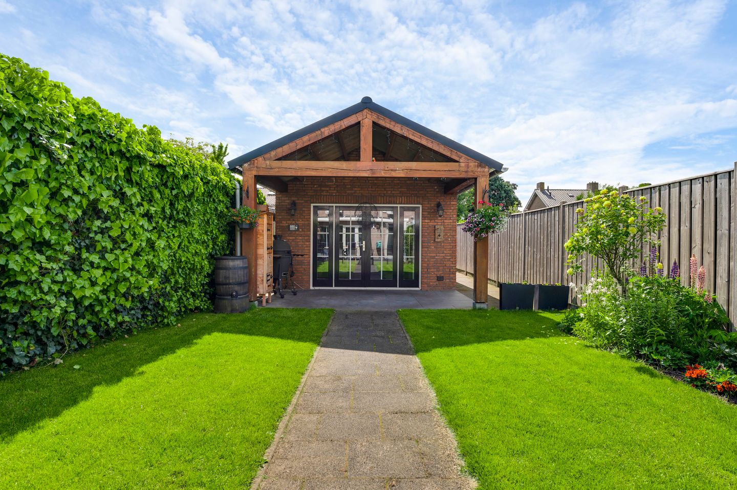 Royally extended family home with garden room in Maarheeze — 34
