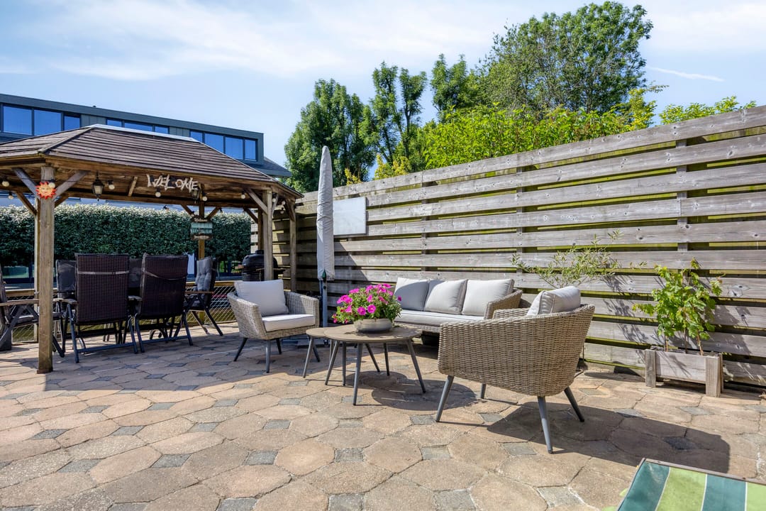 Spacious semi-detached family home with 5 bedrooms, garage, and sunny west-facing waterfront garden — 22