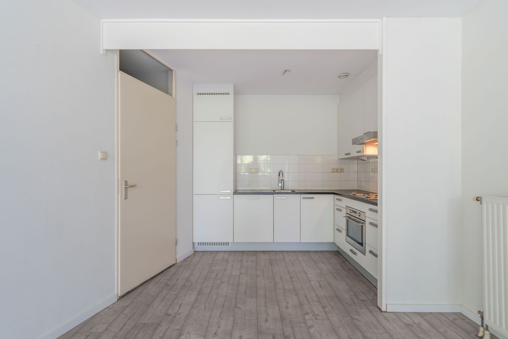 Spacious Apartment with Balcony and Private Parking in Central Weert — 18