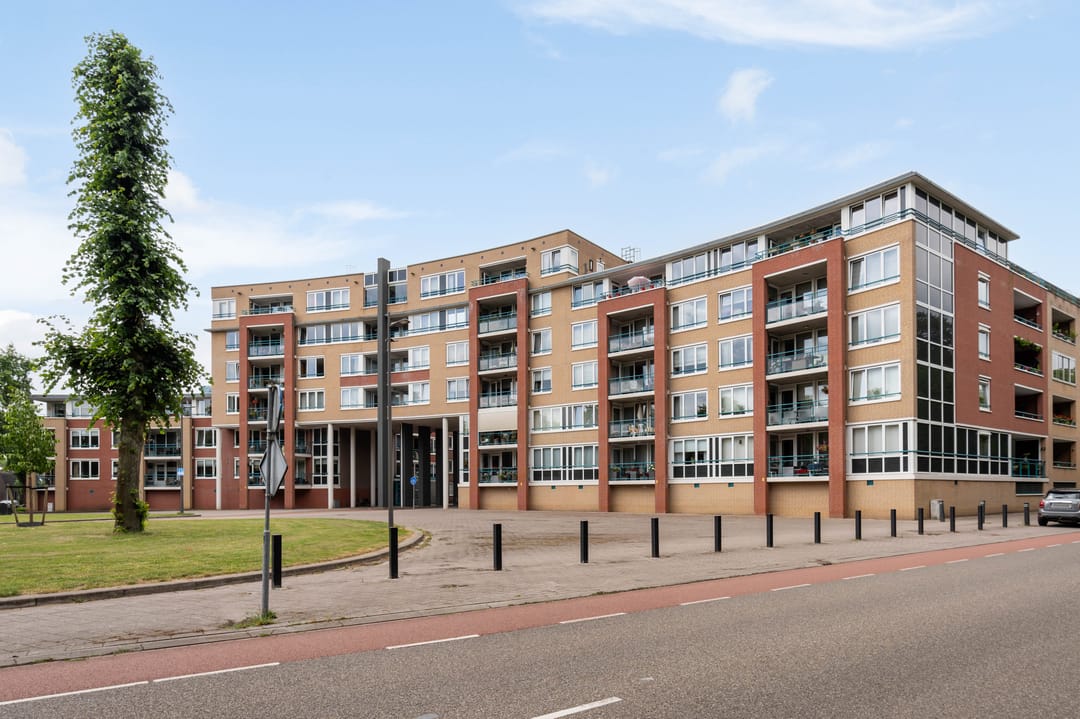 Spacious Apartment with Balcony and Private Parking in Central Weert