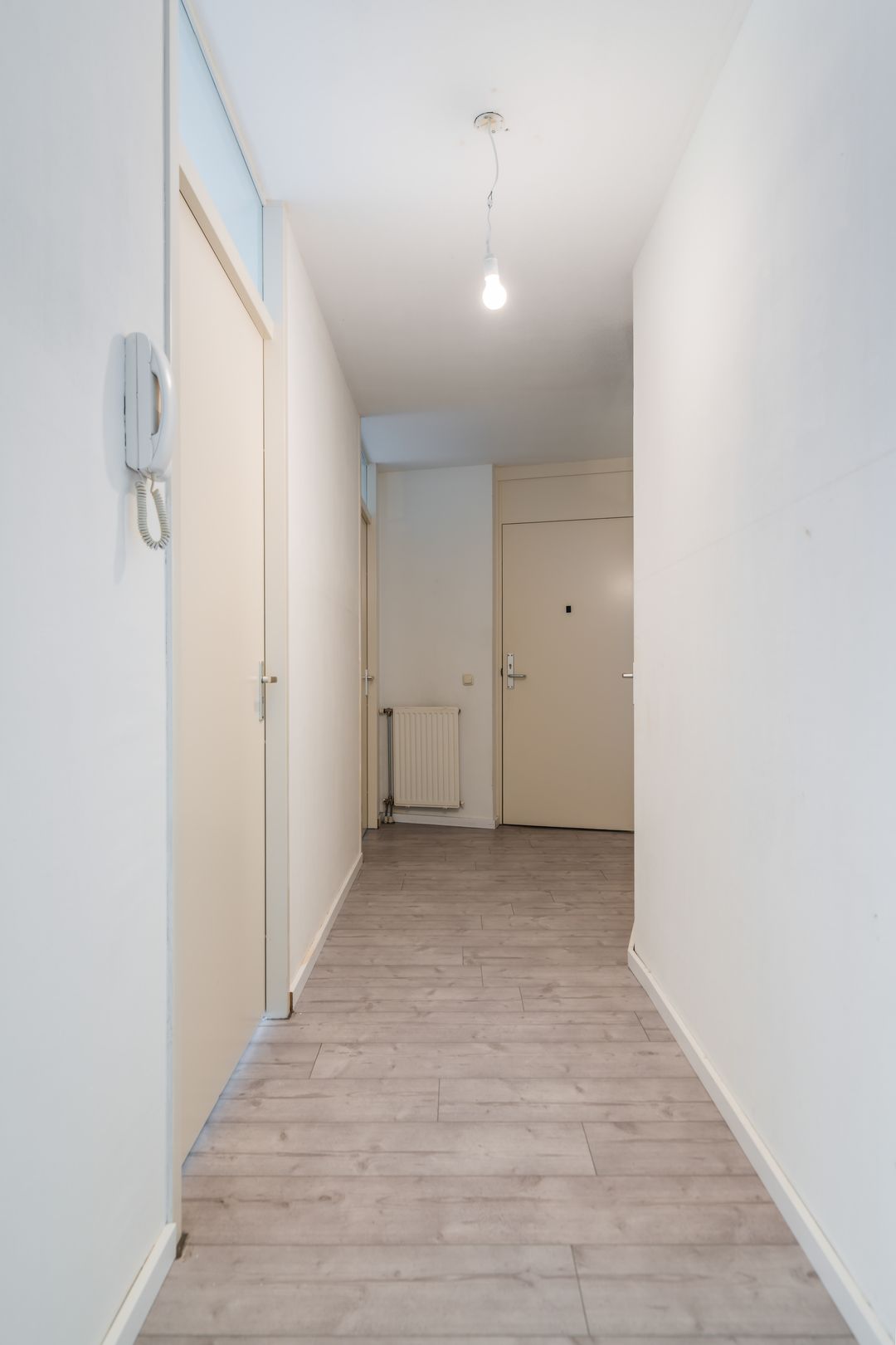 Spacious Apartment with Balcony and Private Parking in Central Weert — 13