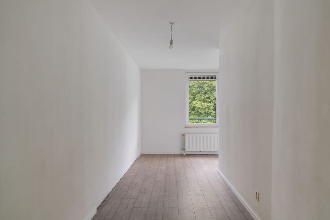 Spacious Apartment with Balcony and Private Parking in Central Weert — 22