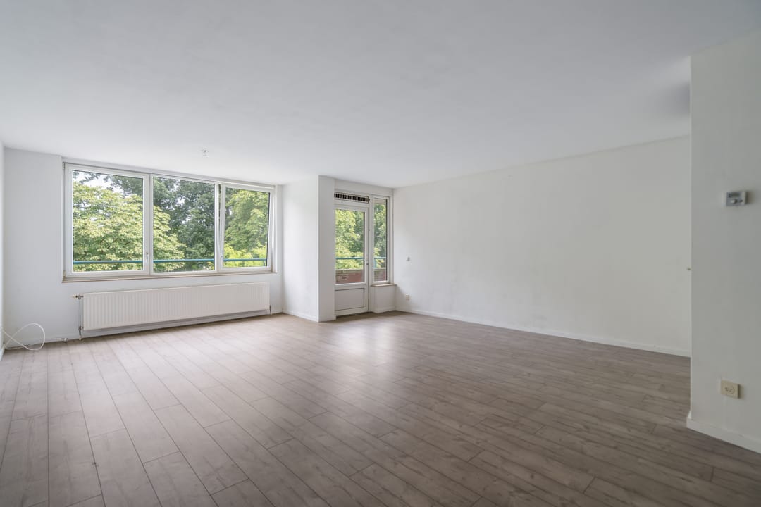 Spacious Apartment with Balcony and Private Parking in Central Weert — 16