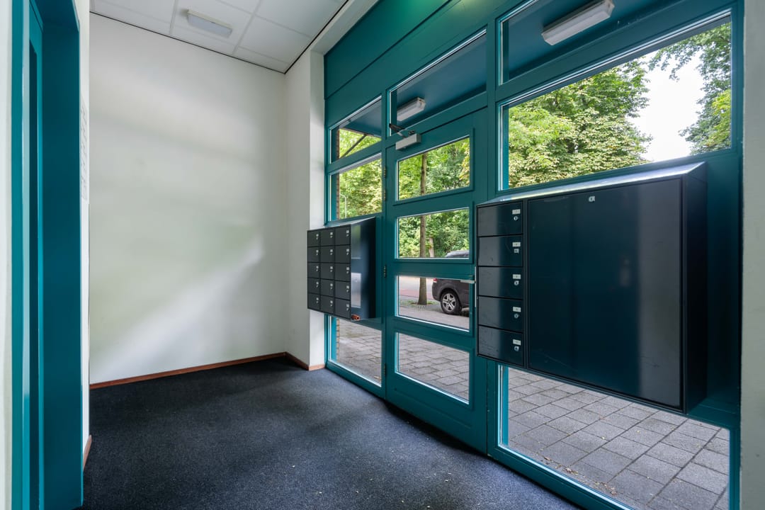 Spacious Apartment with Balcony and Private Parking in Central Weert — 8