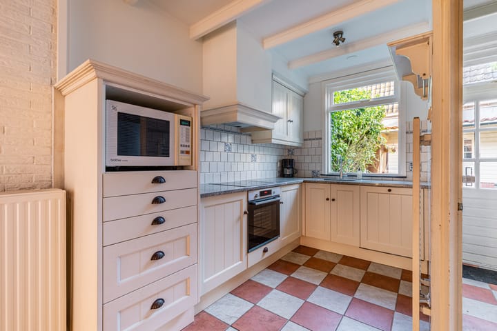 Tussenwoning te koop: Nieuwstraat 115, Weesp