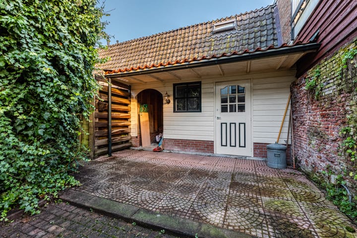 Tussenwoning te koop: Nieuwstraat 115, Weesp