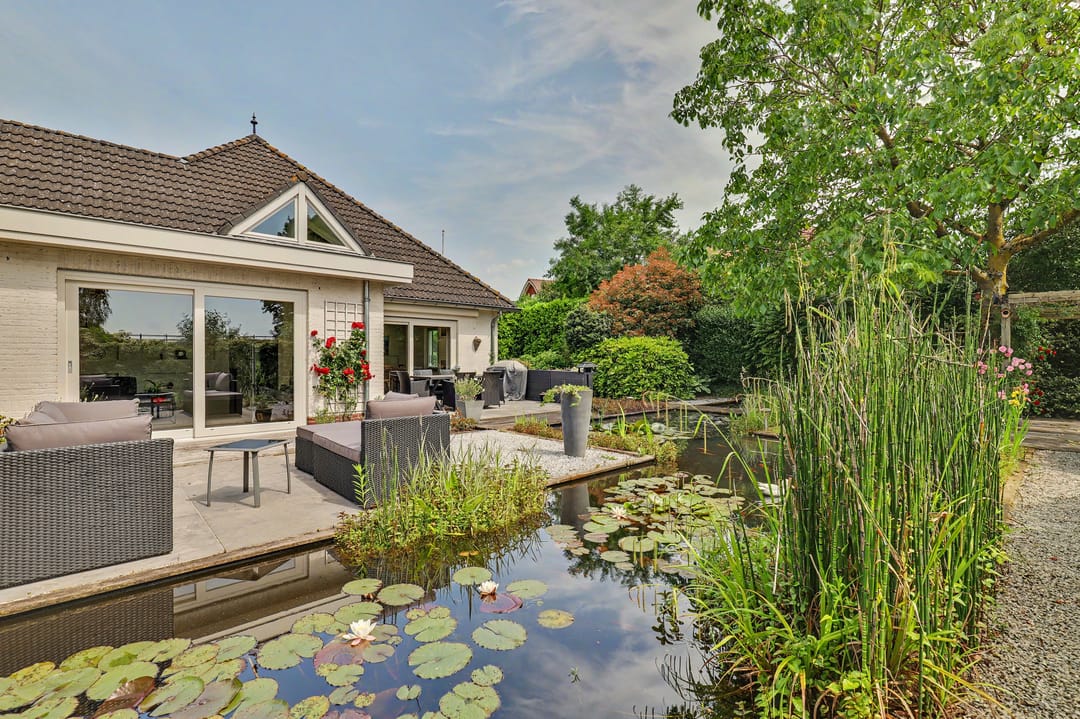 Spacious and Well-Maintained Detached Semi-Bungalow with Stunning Garden in Vlijmen — 38