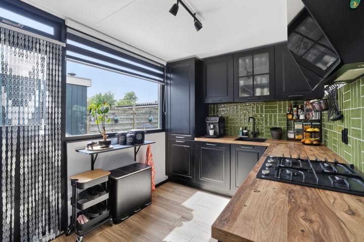 Tussenwoning te koop: Kwartelstraat 23, Lisse