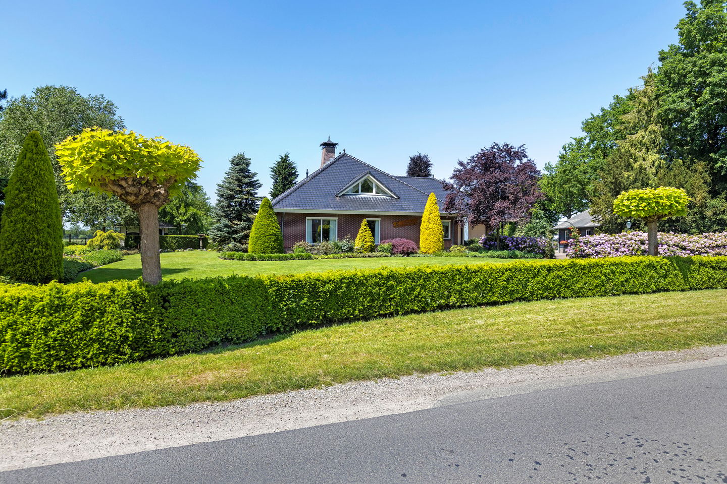 Spacious Detached Villa with Extensive Land and Private Garden — 70