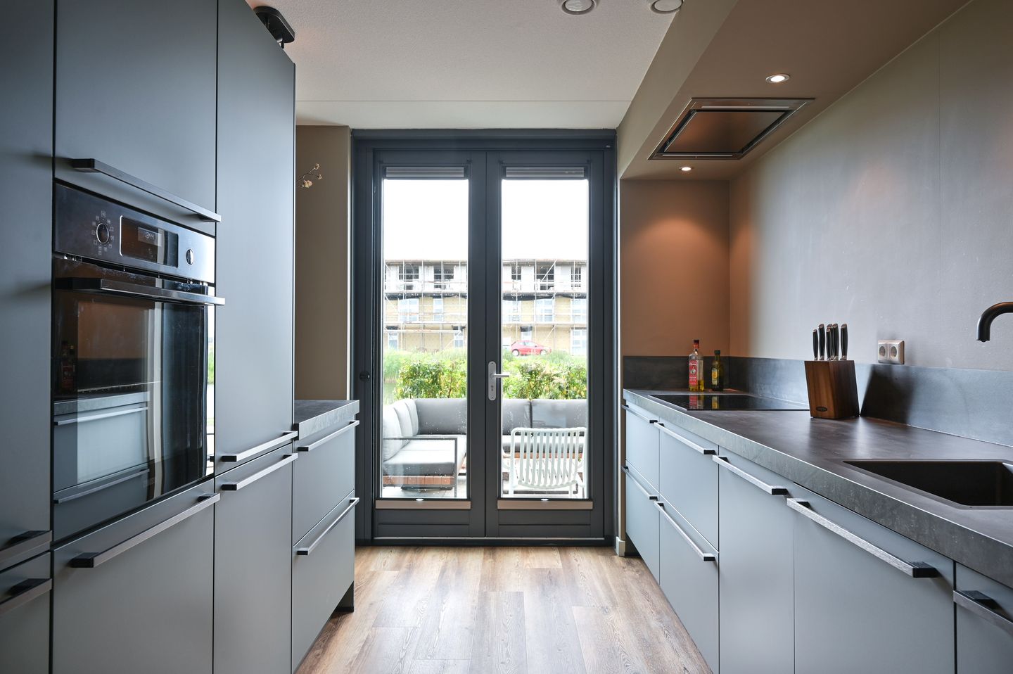 Foto 4 van Wijde Mantel 12