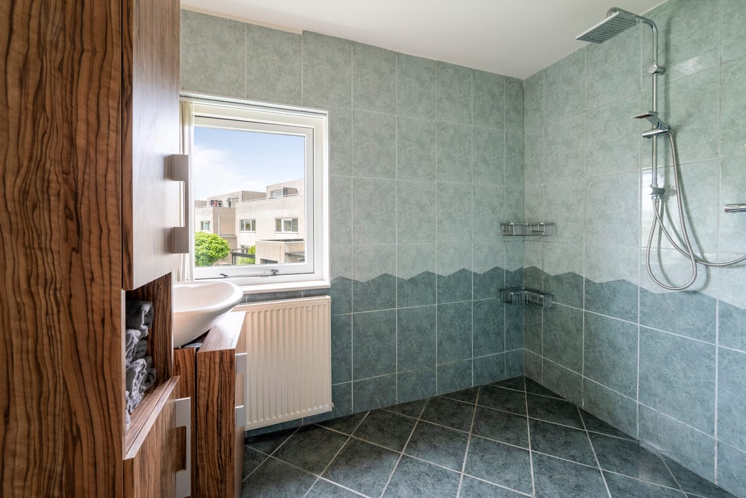 Spacious and Sustainable Semi-Detached Home with Private Water Access in Velserbroek — 31