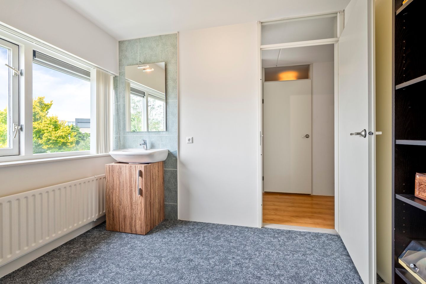 Spacious and Sustainable Semi-Detached Home with Private Water Access in Velserbroek — 35